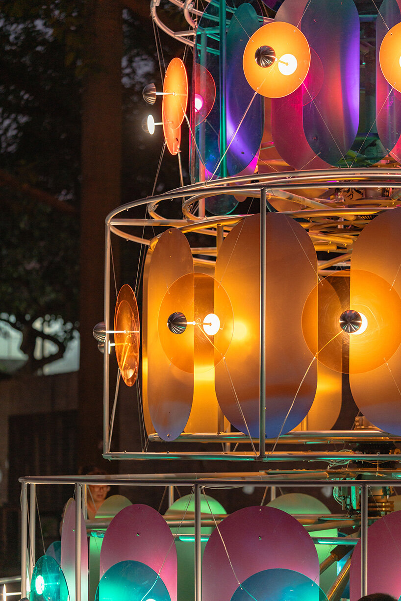 cake-like layers stack into a shared motion installation in china, bringing strangers into sync - 11