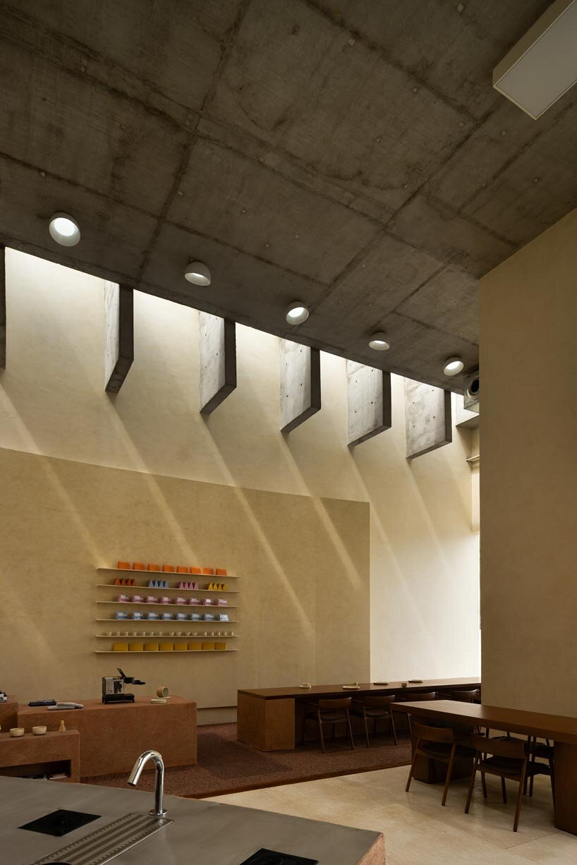 café’s sand-hued sculpted volumes draw from its coastal context in India - 7