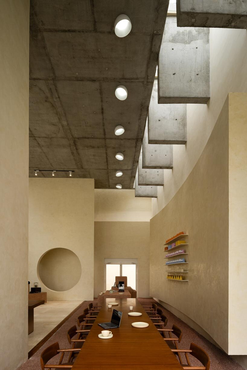 café’s sand-hued sculpted volumes draw from its coastal context in India - 3