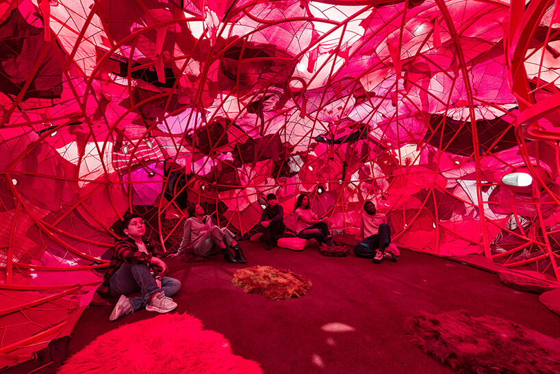 chiharu shiota's woven webs meet yin xiuzhen's clothing installations at hayward gallery - 8