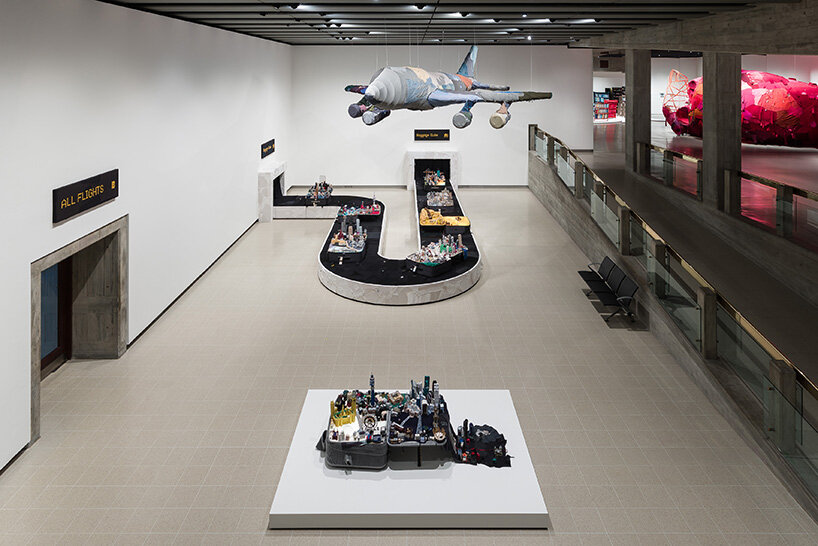 chiharu shiota's woven webs meet yin xiuzhen's clothing installations at hayward gallery - 11