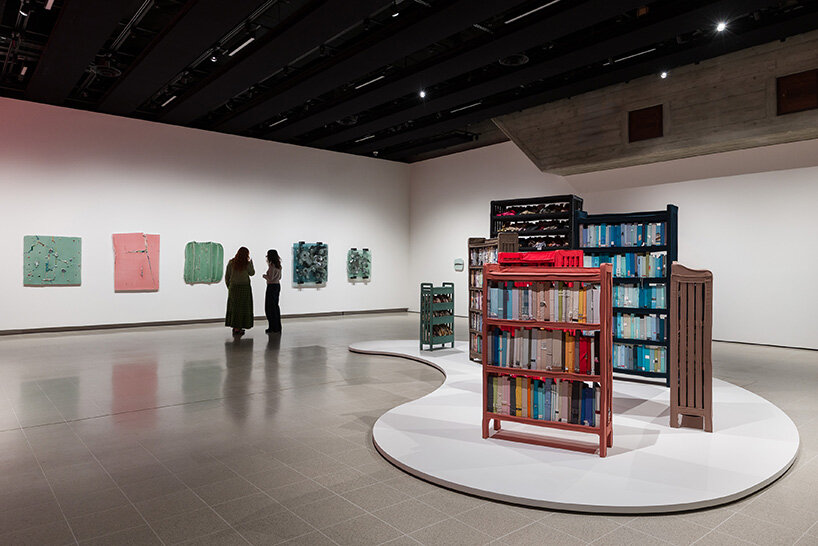 chiharu shiota's woven webs meet yin xiuzhen's clothing installations at hayward gallery - 10