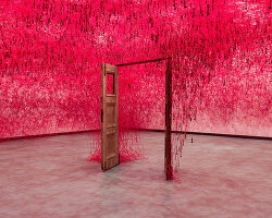 chiharu shiota's woven webs meet yin xiuzhen's clothing installations at hayward gallery
