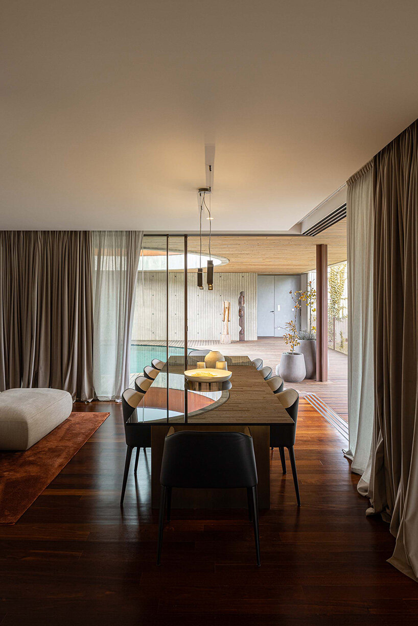 circular courtyard pool opens house by pedro henrique to sky and light in portugal - 9
