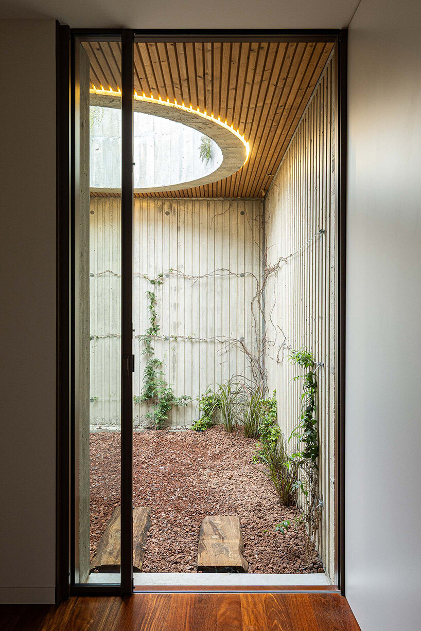 circular courtyard pool opens house by pedro henrique to sky and light in portugal - 13