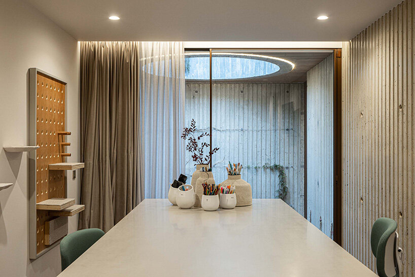 circular courtyard pool opens house by pedro henrique to sky and light in portugal - 11