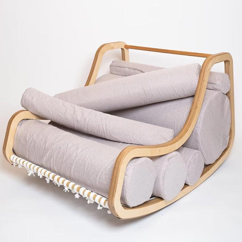 a series of movable cylindrical cushions reposition to form modular column chair - 1