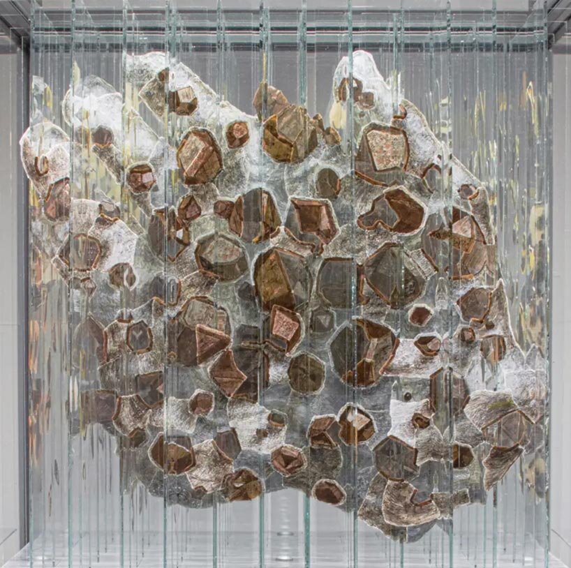 anamorphic installation by thomas medicus&nbsp;rotates into four shifting hand images - 1