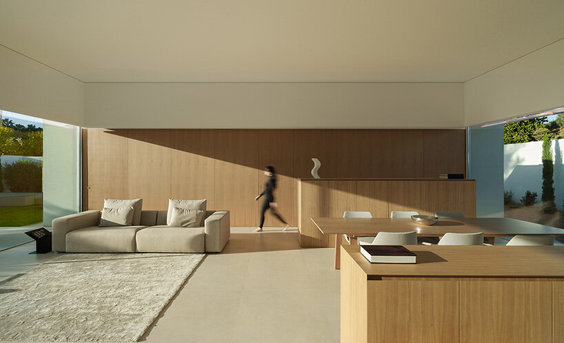 fran silvestre organizes three-part house around hovering living volume in spain - 11