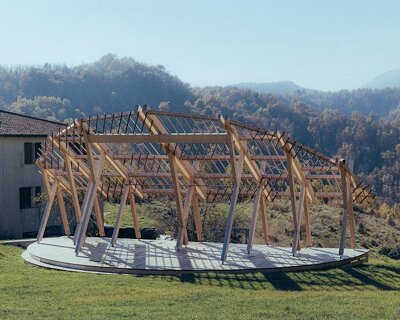 GRRIZ shapes reversible timber structure along the arc of the setting sun in italian mountains