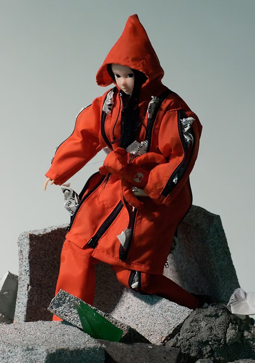 kosuke tsumura's 44-pocket parka explores survival through wearable space - 7