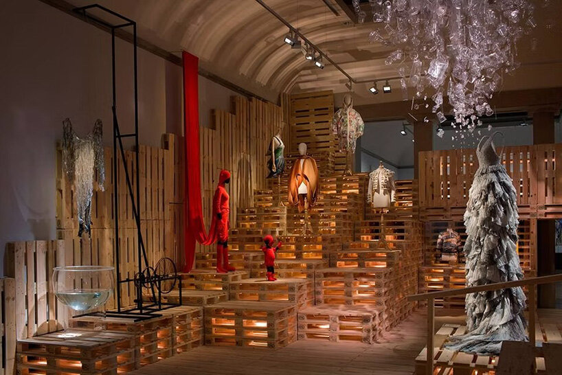 kosuke tsumura's 44-pocket parka explores survival through wearable space - 9