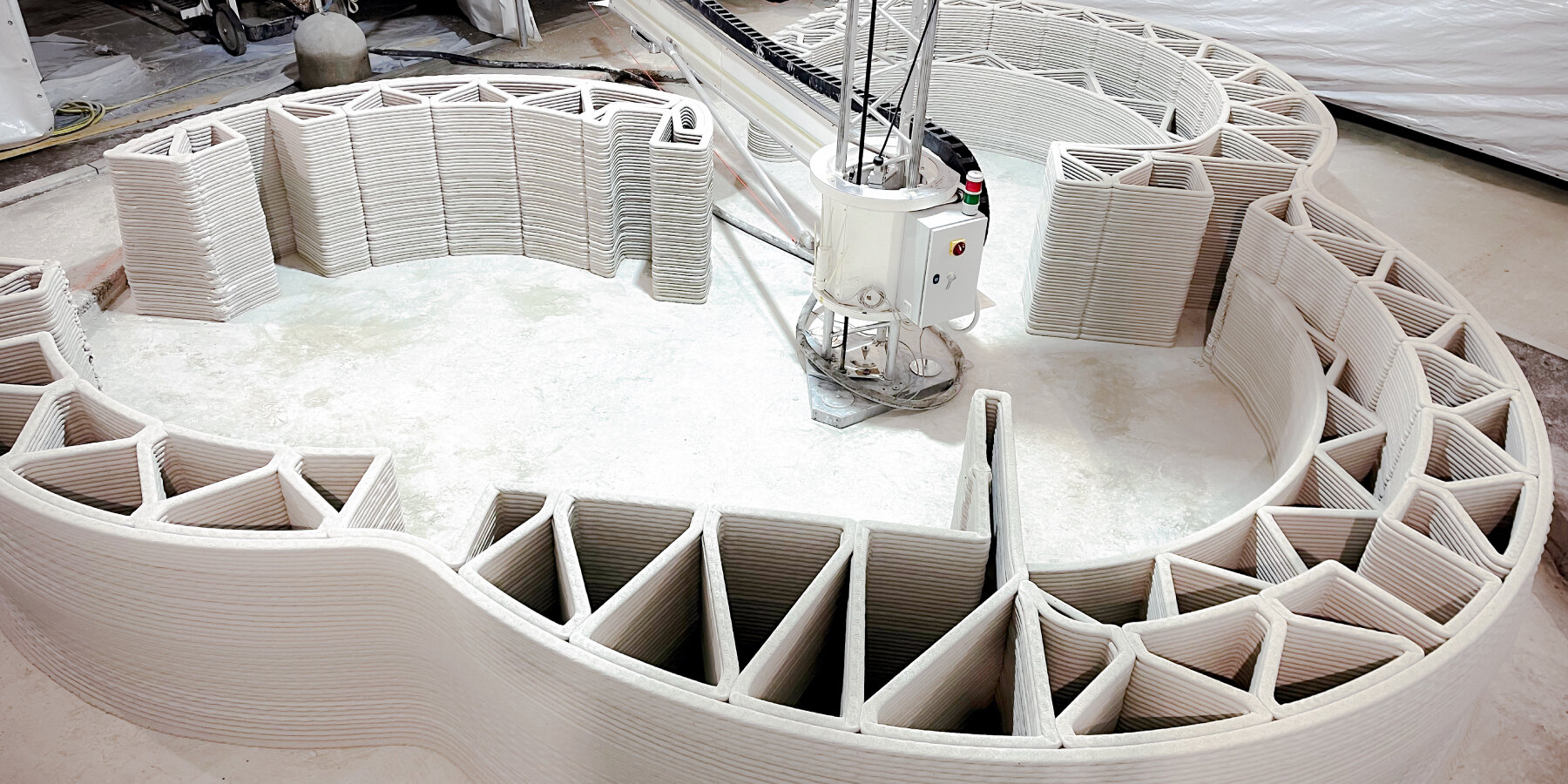 lime-based-walls-capture-carbon-first-3D-printed-airport-building-bergamo-designboom-ban