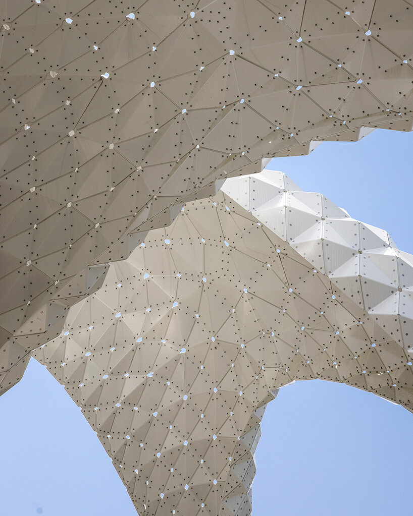 riveted aluminum panels form cocoon-like pavilion by MARC FORNES / THEVERYMANY - 10