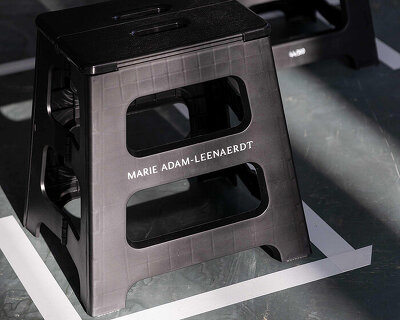 marie adam-leenaerdt invites guests to build the runway with modular stools in paris