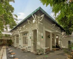century-old courtyard villa in vietnam revives as matte teabar flagship
