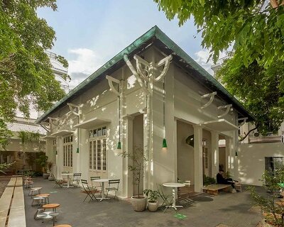 century-old courtyard villa in vietnam revives as matte teabar flagship