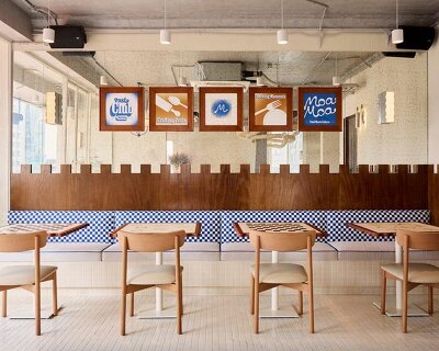 mosaic gradients and graphic pasta motifs animate restaurant’s interiors in vietnam
