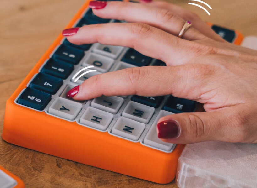 it is a split, ortholinear keyboard with raised-edge keycaps