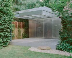 neiheiser argyros’ london pavilion combines storage cabinet and garden canopy in one