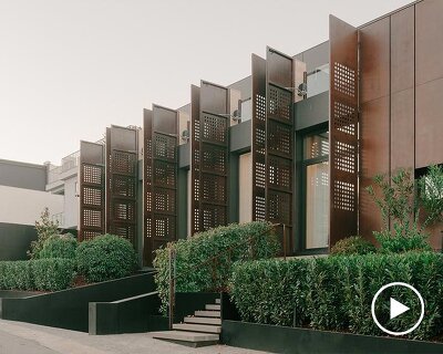 punctured iron doors shape kinetic facade by TIMM architecture in tbilisi