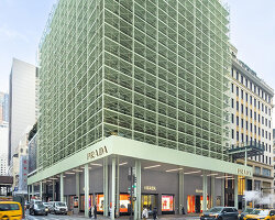 shimmering moiré facade of prada flagship in NYC rethinks the permanence of scaffolding