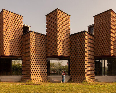 wallmakers rethinks tropical design through reused shipping containers and poured earth