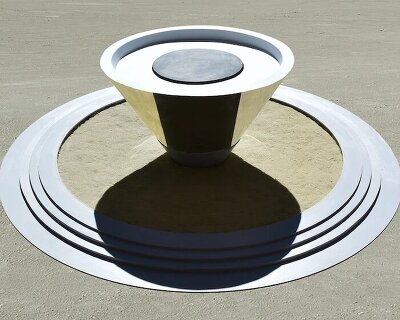 playful interactive cone installation reflects viewers' sand art back to them