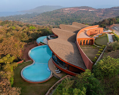 sanjay puri architects shapes 'crest nine' with a parabolic rooftop above the arabian sea