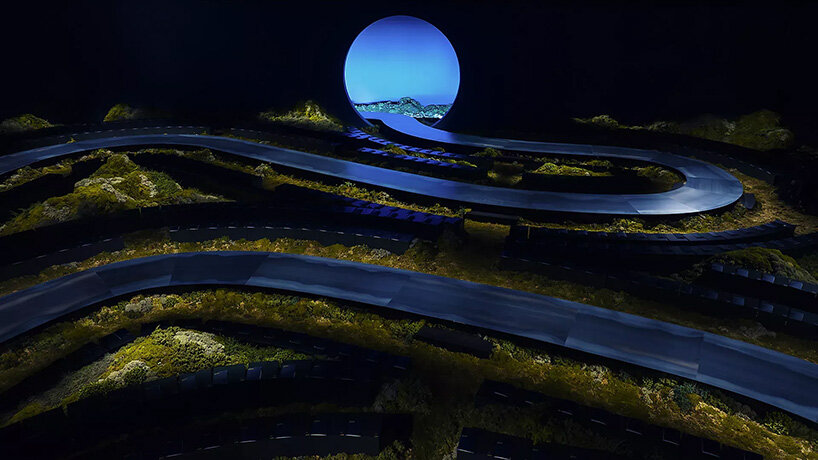 serpentine runway of moss and moonlight stages Herm&egrave;s FW26 show in paris - 2