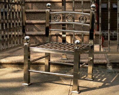 assembled from steel fence components, white picket chair challenges the american dream