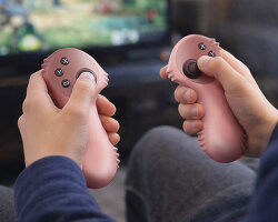 wireless gaming controllers for pre-teens grip around hands with sea horse-inspired ridges