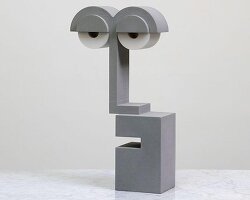 YAWN concrete nightlight sculpts a playful face-like expression
