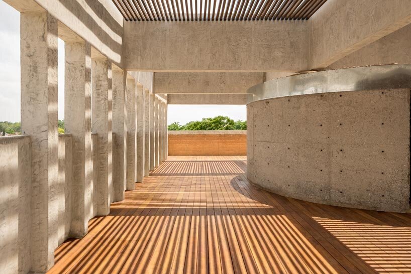 rammed earth finned facade wraps adjaye associates’ studio in accra, ghana - 10