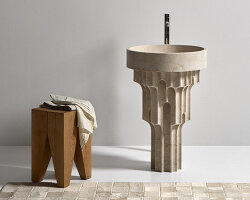 paolo ulian sculpts carsico washbasin from marble for antoniolupi