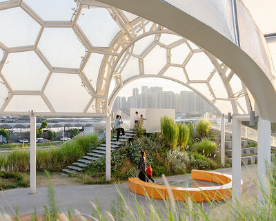 clustered domes dot this landscaped rooftop park atop reworked warehouses