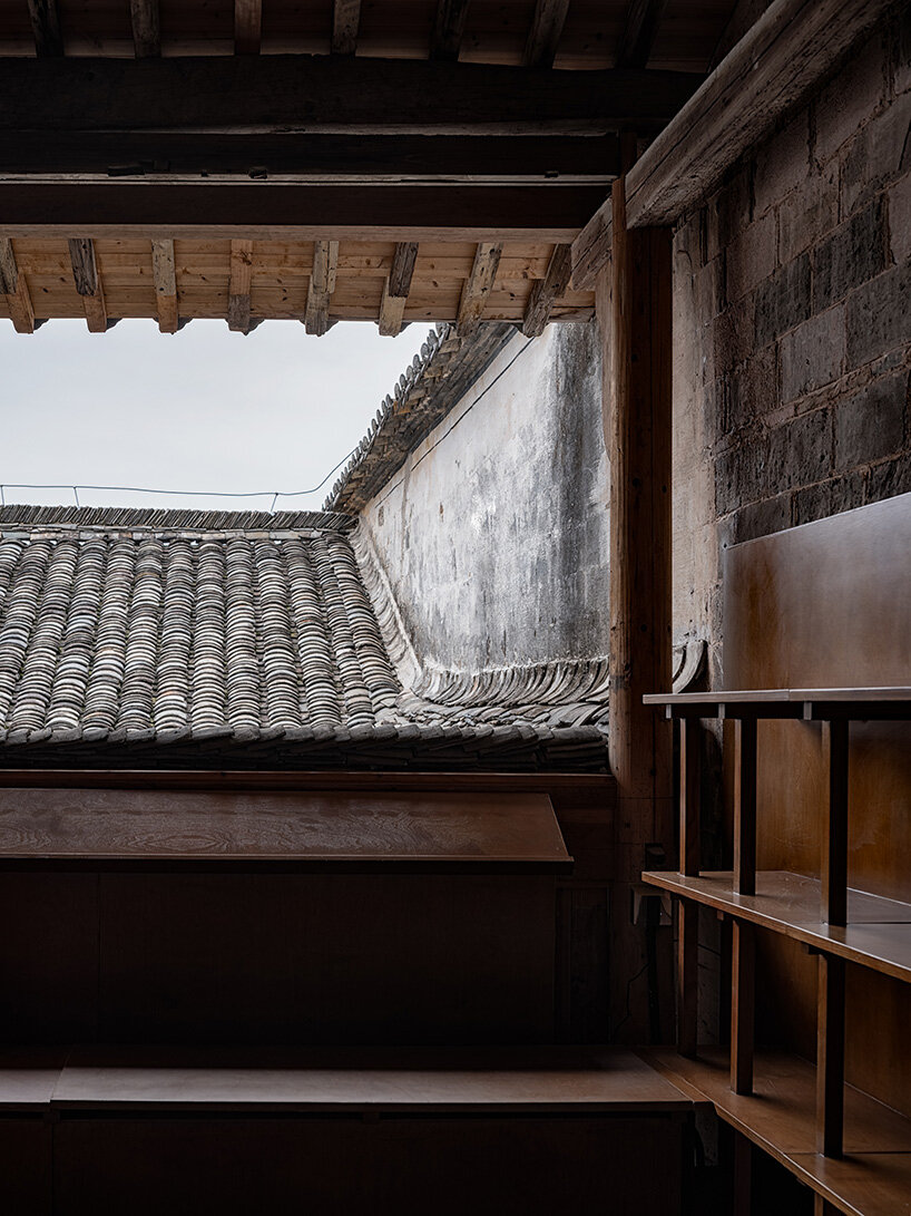 atelier guo inserts cinema into an ancestral hall in china without touching its past - 14