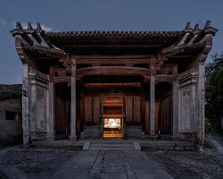 atelier guo inserts cinema into an ancestral hall in china without touching its past