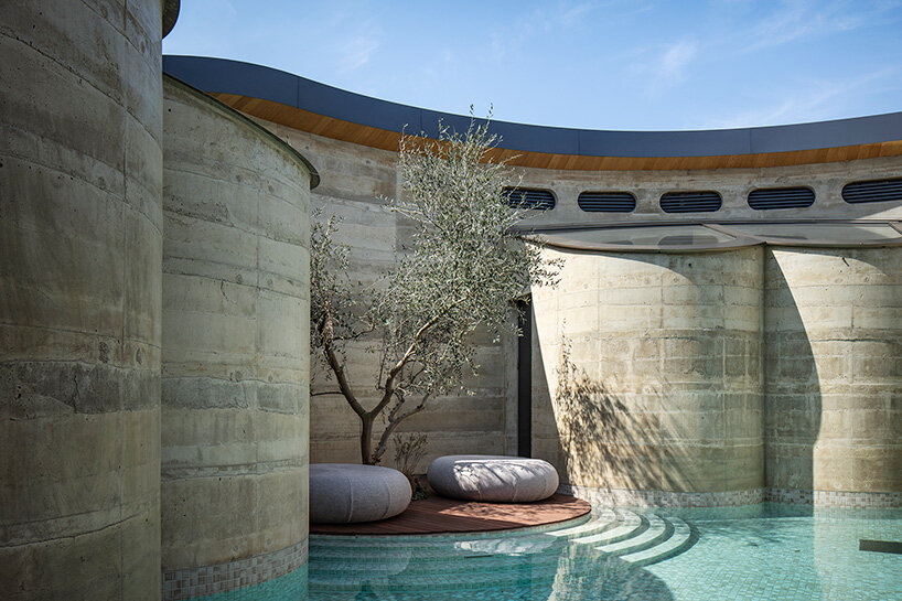bjarke ingels group completes three rammed earth villas for NOT A HOTEL in japan - 5