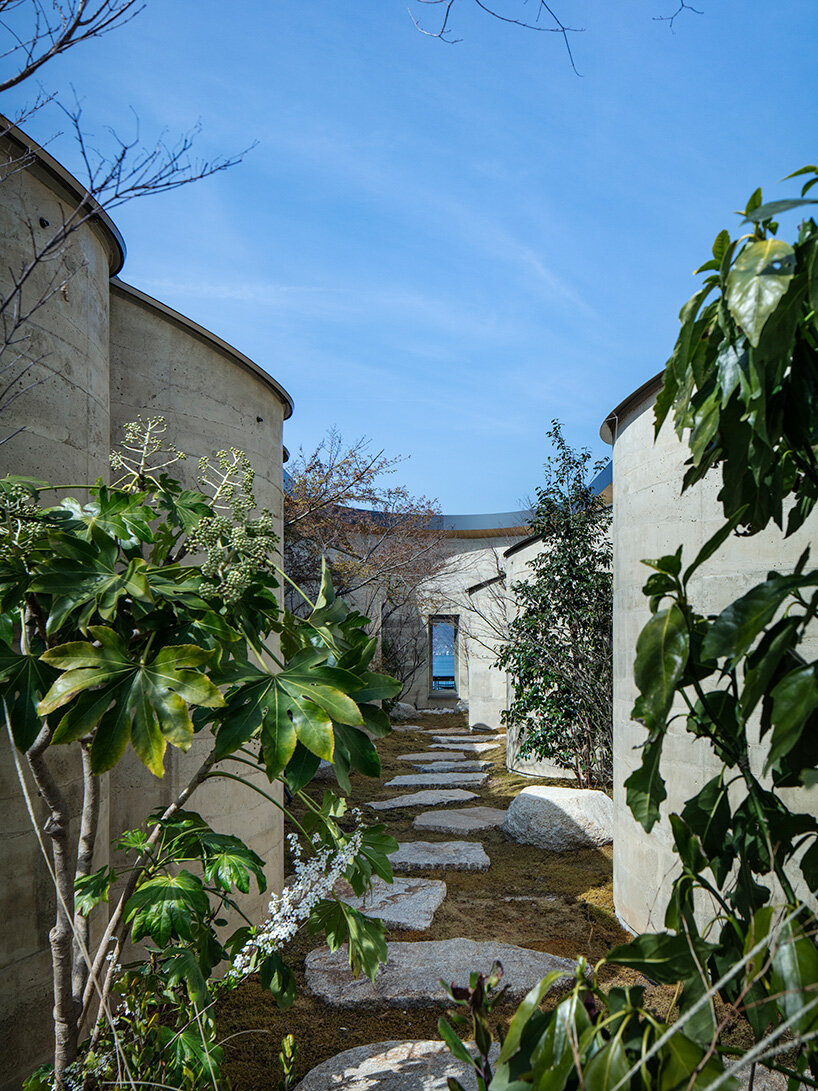 bjarke ingels group completes three rammed earth villas for NOT A HOTEL in japan - 6