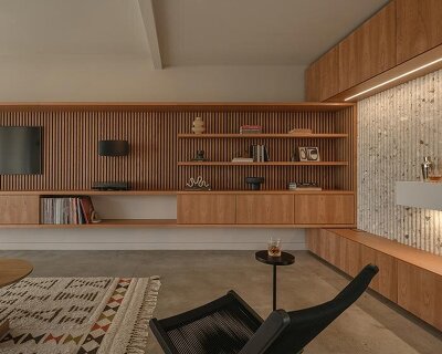 interlocking millwork volumes reshape brooklyn apartment into layered interior