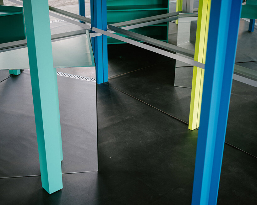 fala turns leftover metal into color-coded grid that multiplies itself through mirror in porto - 11