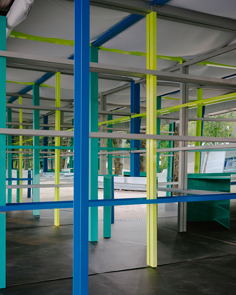 fala turns leftover metal into color-coded grid that multiplies itself through mirror in porto - 9