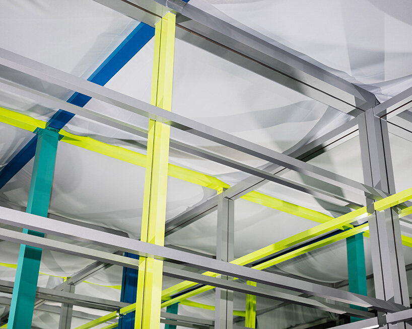 fala turns leftover metal into color-coded grid that multiplies itself through mirror in porto - 10