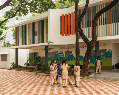 open corridors become classrooms as color and movement reshape an indian school campus