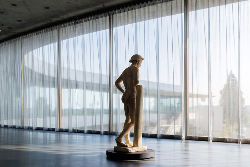 peter zumthor's david geffen galleries open at LACMA as a sweeping glass-and-concrete arc - 10
