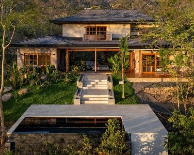 recycled ocean-plastic tiles, timber, and stone shape tropical house on costa rica’s coast