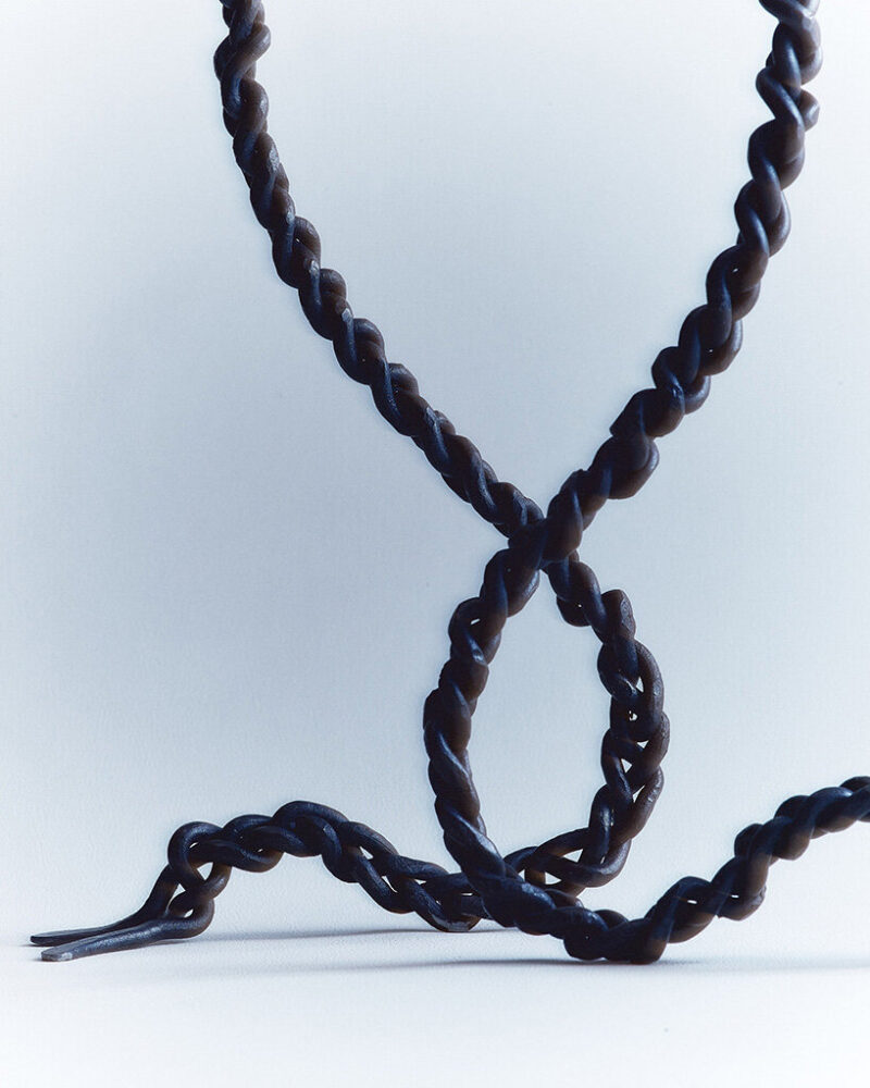 interlaced wood, metal, and fiber explore braiding as construction method in trenzar series - 6