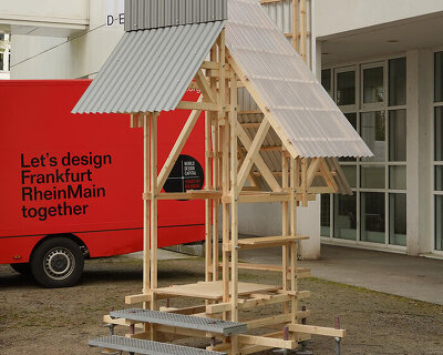 frankfurt students build mobile voting booth with timber frame and climbable platforms