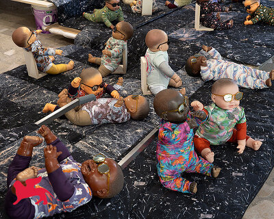 208 baby dolls animate japan pavilion in ei arakawa-nash's playful ode to care